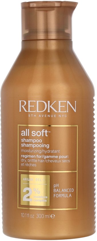 Bouteille dorée Redken All Soft shampooing avec étiquette dorée et texte '2% complexe hydratant'. 300 ml.