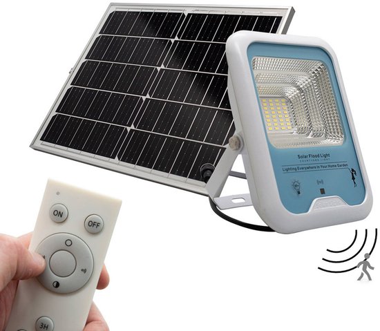 Zonne-energie schijnwerper en zonnepaneel, met afstandsbediening, op witte achtergrond.