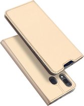 Hoesje geschikt voor Samsung Galaxy A30 - dux ducis skin pro book case - goud