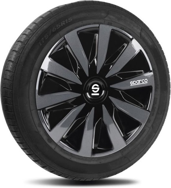 Een 15 inch wieldop in zwart en grijs gemonteerd op een autoband.