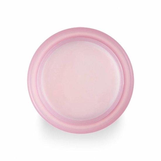 Van bovenaf gezien, een roze pot met witte deksel, gevuld met roze substantie.
