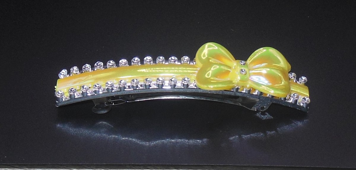 Patentspeld smal strik geel met strass punten