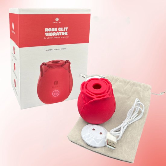 Erodit Rose Clit Vibrator in verpakking, met vibrator, oplaadkabel en stoffen opbergzakje.