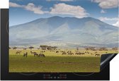 KitchenYeah® Inductie beschermer 76x51.5 cm - Wilde dieren grazen op de savanne van het Nationaal park Serengeti - Kookplaataccessoires - Afdekplaat voor kookplaat - Inductiebeschermer - Inductiemat - Inductieplaat mat