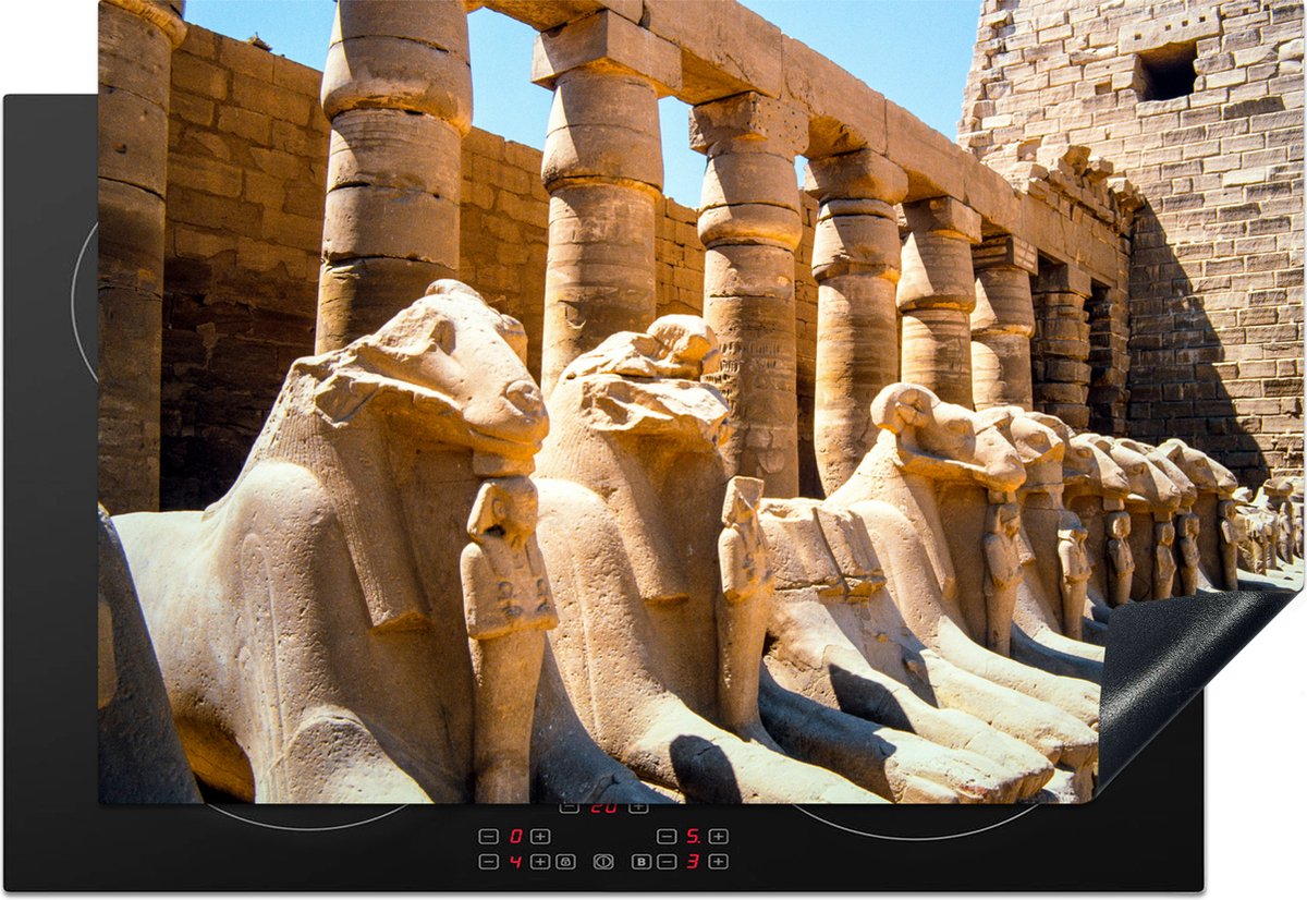 KitchenYeah® Inductie beschermer 76x51.5 cm - Aantal beelden in het tempelcomplex van Karnak in Egypte - Kookplaataccessoires - Afdekplaat voor kookplaat - Inductiebeschermer - Inductiemat - Inductieplaat mat - Merkloos