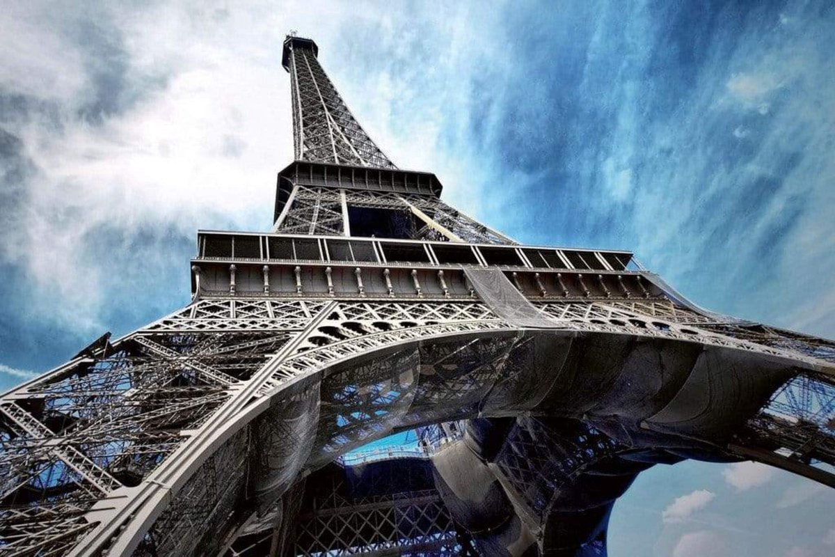 Fotobehang - Eiffel Tower 375x250cm - Vliesbehang