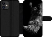 Bookcase Geschikt voor iPhone 12 Pro telefoonhoesje - Neushoorn - Wild dier - Portret - Met vakjes - Wallet case met magneetsluiting