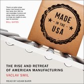 Bruine doos met 'MADE - IN THE - USA' stempel, op een transportband.