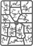 Platine grise moulée par injection avec de nombreuses petites figurines démoniaques de Tzeentch Blue Horrors.