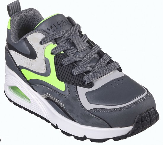 Grijze sneaker met neon groene en lichtgrijze panelen, witte zool en SKECHERS LOS ANGELES logo.