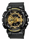 Zwart G-Shock horloge met goudkleurige wijzerplaat, digitale en analoge display, en waterbestendige constructie.