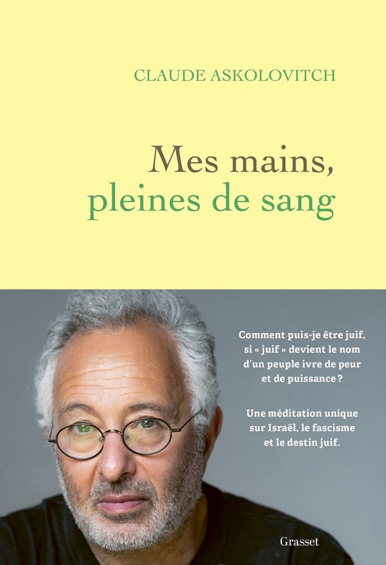 Couverture de livre : Claude Askolovitch à lunettes sur fond jaune avec le titre 'Mes mains, pleines de sang'.