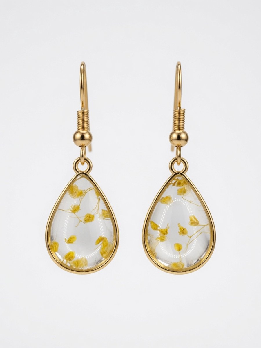MoMo & More - Epoxy Forever Leaf Earrings - Goudkleurige Gele Blad Oorbellen - 316L RVS