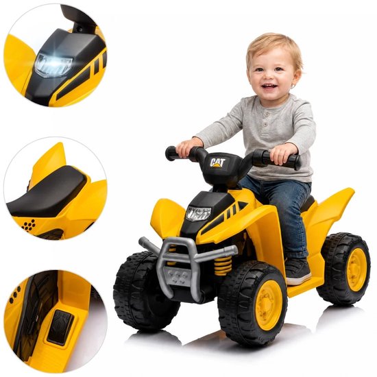 Gele kinderquad met CAT-logo, een jongen rijdt erop. Details: koplampen, zwarte zitting, knoppen.