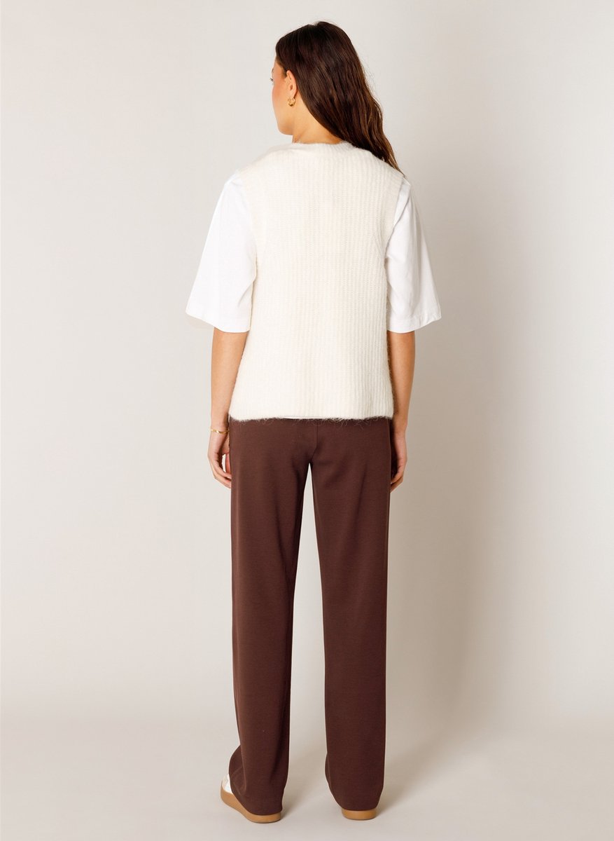 Base Level vest Nell
