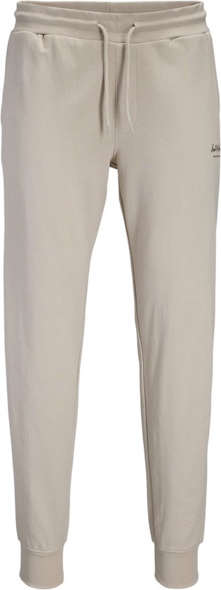 Beige joggingbroek met trekkoord, elastische tailleband en boorden.