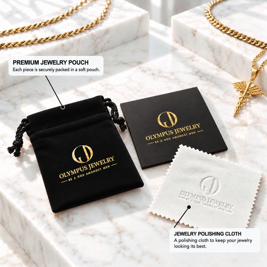 Olympus Jewelry geschenkset met zwart fluwelen zakje, zwarte kaart en wit poetsdoekje op een marmeren ondergrond.