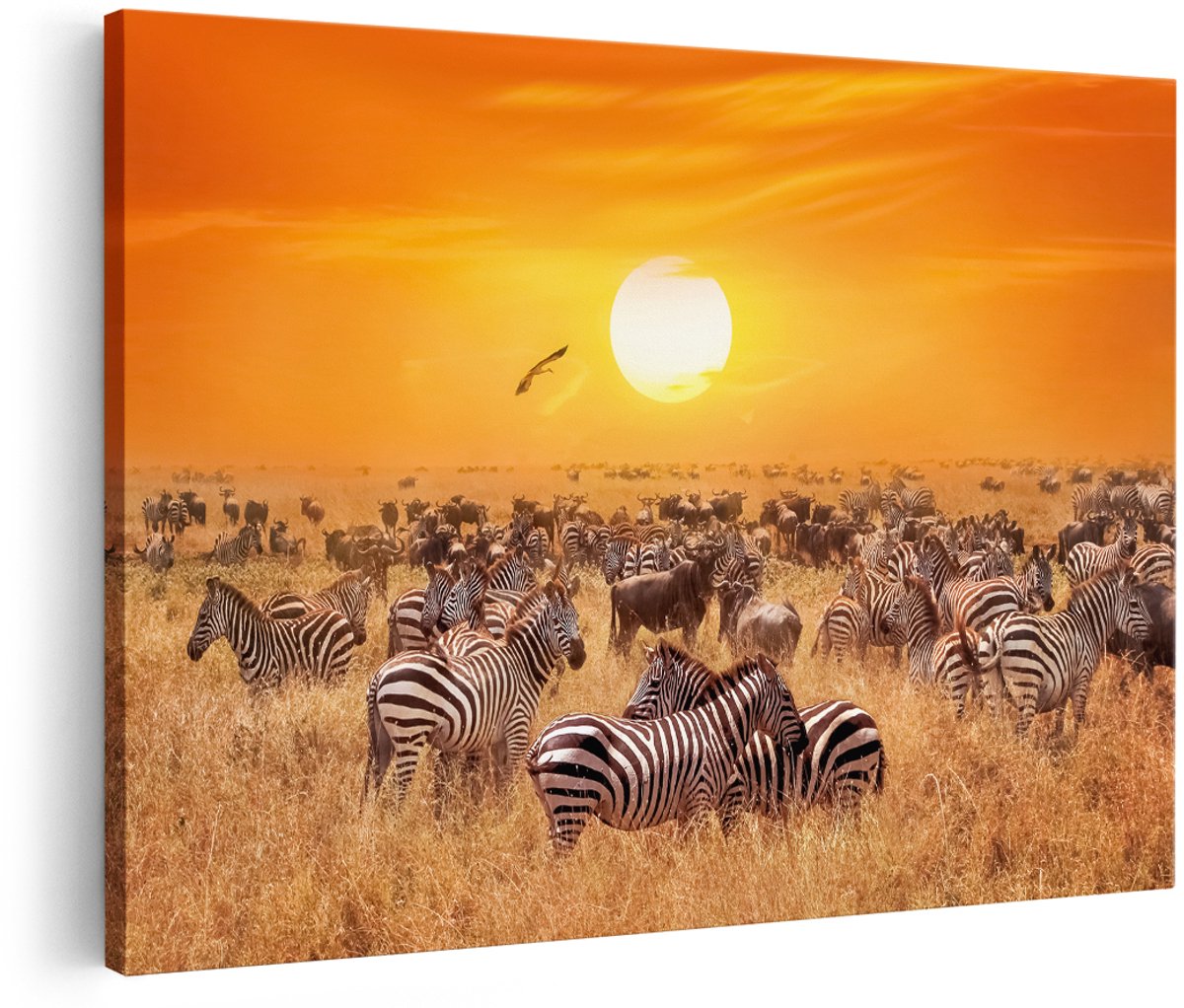Artaza Canvas Schilderij Kudde Zebra's Bij Een Oranje Zonsondergang - 150x100 cm - Groot - Foto Op Canvas - Wanddecoratie Woonkamer