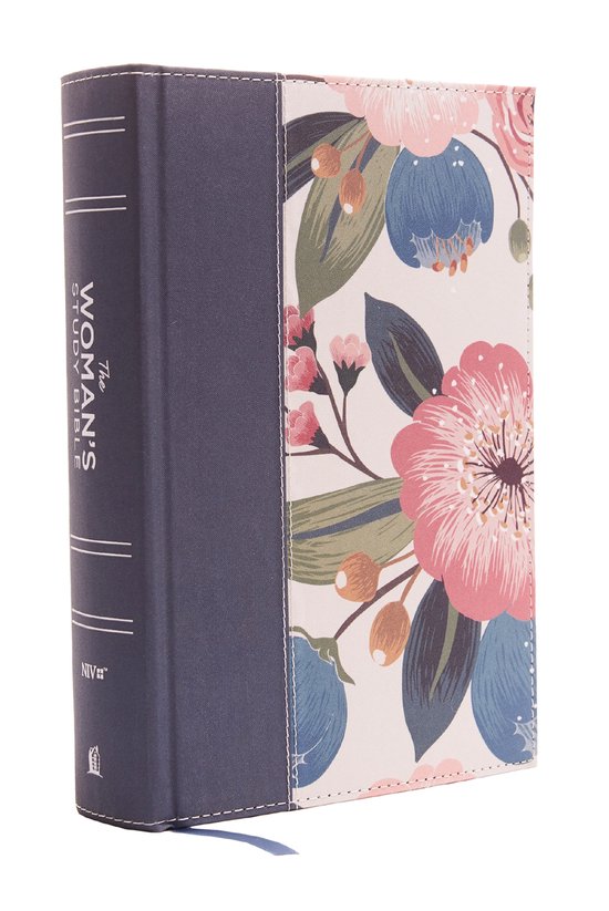 The Woman's Study Bible, blauw met een bloemenpatroon van roze en blauwe bloemen met groene bladeren.
