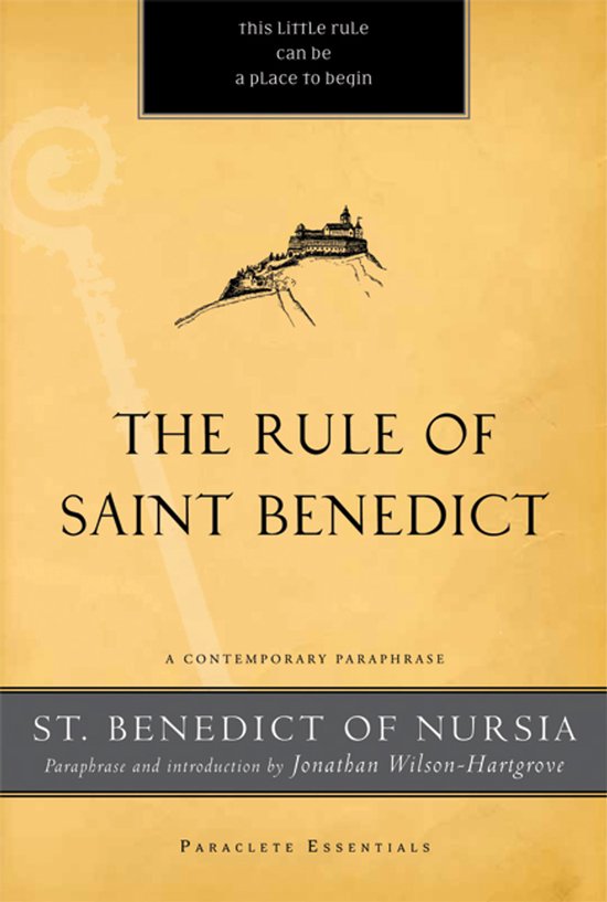 Livre 'THE RULE OF SAINT BENEDICT' avec une illustration d'un bâtiment sur une colline.