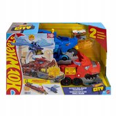 Hot Wheels City verpakking met rode en blauwe draak vrachtwagens, met 'Hot Wheels' logo.
