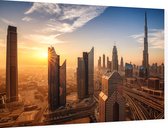 Skyline van Dubai met de Burj Khalifa bij zonsopgang - Foto op Dibond - 90 x 60 cm