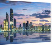 Uitzicht op de skyline van Abu Dhabi bij zonsondergang - Foto op Plexiglas - 60 x 40 cm