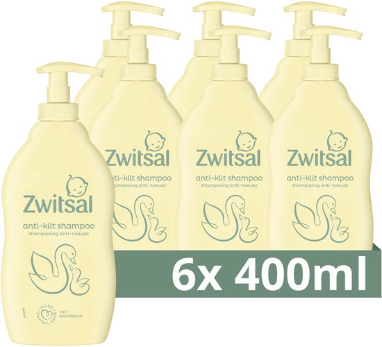 Zes crèmekleurige flessen Zwitsal anti-klit shampoo, 6x 400ml.