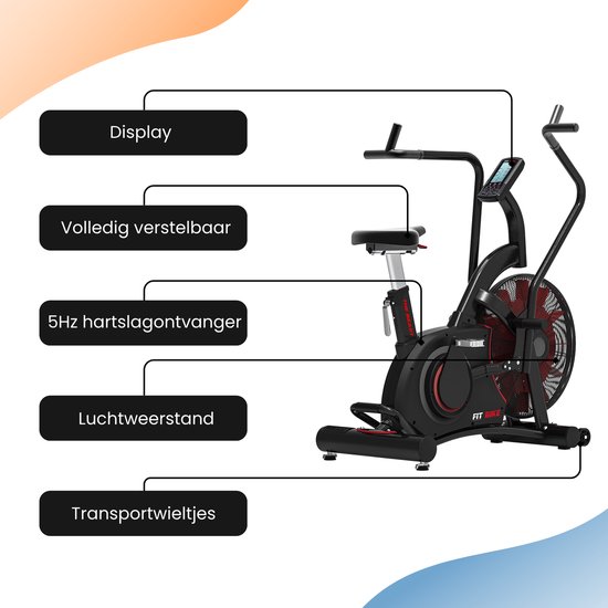 Zwart 'FIT BIKE The Beast' airbike met rode accenten, duidelijke labels voor 'Display', 'Volledig verstelbaar', '5Hz hartslagontvanger', 'Luchtweerstand' en 'Transportwieltjes'.