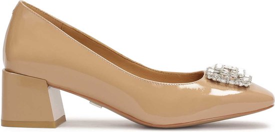 Beige pumps with jewelry embellishment
