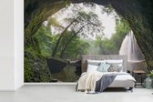 Behang - Fotobehang Een grot in het Nationaal park Na Haew in Thailand - Breedte 375 cm x hoogte 240 cm