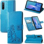 Voor Sony Xperia 10 III Vier-blad sluiting Reliëf Gesp Mobiele Telefoon Bescherming Lederen Case met Lanyard & Card Slot & Portemonnee & Beugel Functie (Blauw)