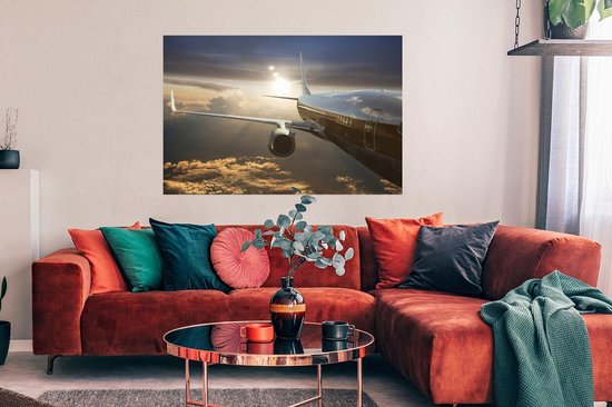 Un avion à réaction survole les nuages Poster 120x80 cm - Tirage photo sur Poster (décoration murale salon / chambre)