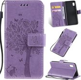 Tree & Cat Pattern Pressed Printing Horizontale Flip PU lederen tas met houder & kaartsleuven & portemonnee & lanyard voor Galaxy A10e (lichtpaars)