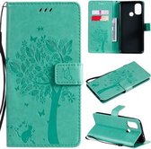 Voor OnePlus Nord N100 Tree & Cat Pattern Pressed Printing Horizontale Flip PU lederen hoes met houder & kaartsleuven & portemonnee & lanyard (groen)