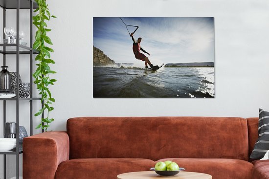 Un homme wakeboard sur toile d'eau de mer calme 120x80 cm - Tirage photo sur toile (Décoration murale salon / chambre)