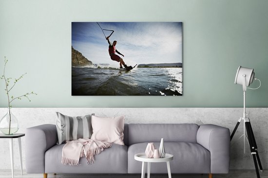 Un homme wakeboard sur toile d'eau de mer calme 120x80 cm - Tirage photo sur toile (Décoration murale salon / chambre)