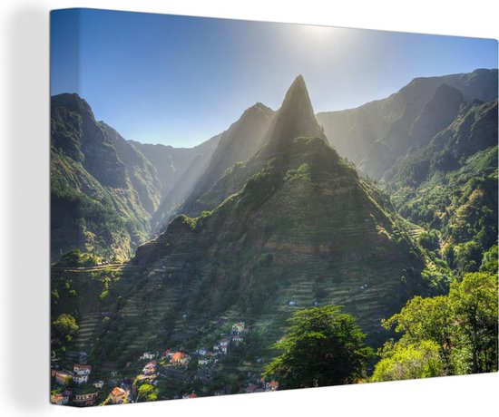 Canvas Schilderij Het zonlicht schijnt op een bergtop van Madeira - 90x60 cm - Wanddecoratie