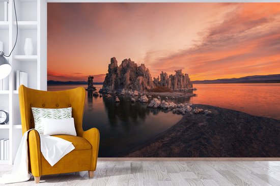 Behang - Fotobehang Gesteente aan de kust - liggend - Breedte 420 cm x hoogte 280 cm