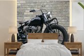 Behang - Fotobehang Zijaanzicht van een antieke motorfiets - Breedte 350 cm x hoogte 350 cm