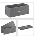Grijze opbergbox met houten handvat, ook gevouwen en open.