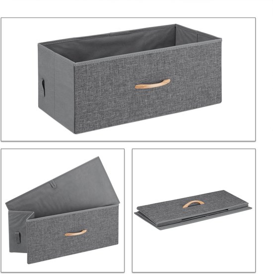 Grijze opbergbox met houten handvat, ook gevouwen en open.