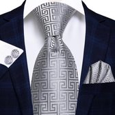 Luxe Grijze stropdas met mooi fantasiepatroon inclusief pochet en manchetknopen.