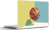 Sticker pour ordinateur portable - 12,3 pouces - Un ballon de basket dans un environnement coloré