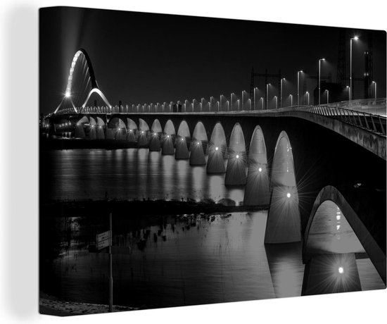 Canvas Schilderij Verlichte brug over de Waal bij Nijmegen - zwart wit - 120x80 cm - Wanddecoratie