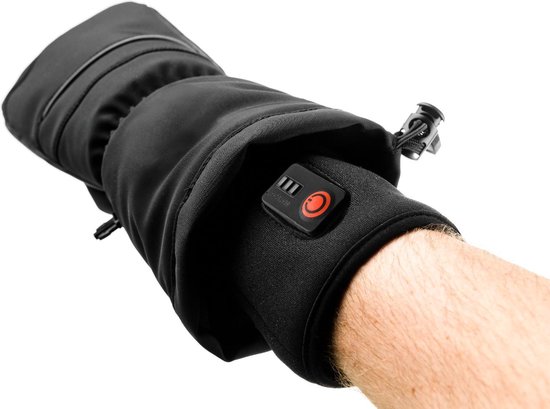 Zwarte verwarmde onderhandschoen om een arm gedragen, met rode bedieningsknop en batterij-indicator.