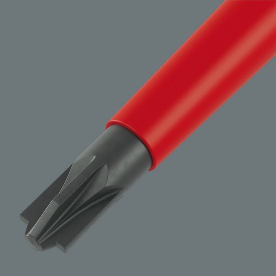 Close-up van een zwart, stervormig schroevendraaierbitje.