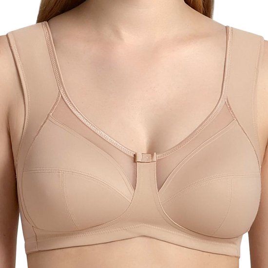 Huidkleurige beha zonder beugel, met mesh in de bovenste cups en sierstrikje bij de sluiting.