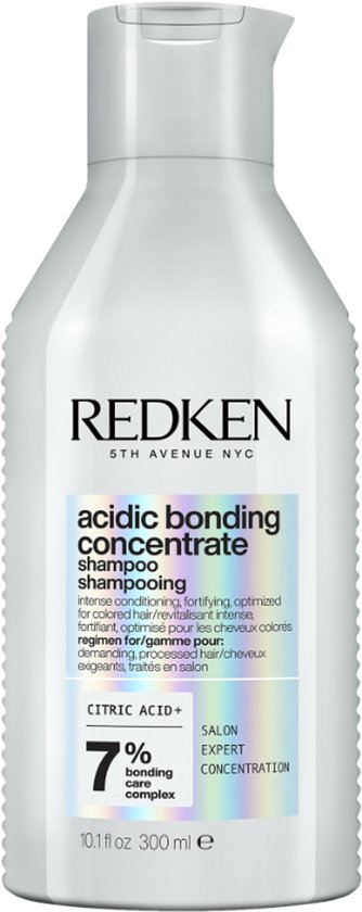 Bouteille de shampooing Redken Acidic Bonding Concentrate de 300 ml avec un corps blanc et des accents argentés et violets.