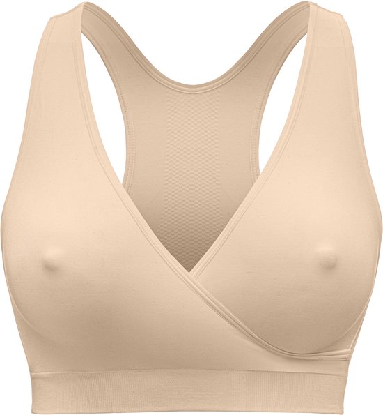 Een beige Medela slaapbeha met een gekruiste voorkant en een racerback, geïsoleerd op een witte achtergrond.